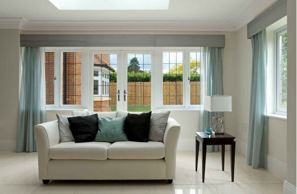 kommerling windows in a lounge with a sofa