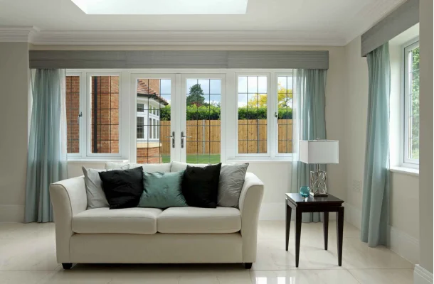 kommerling windows in a lounge with a sofa