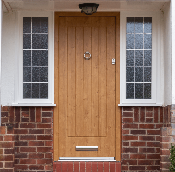 rockdoor indiana composite door installed by alexander windows in wilmslow. Photograph shows the external view.
