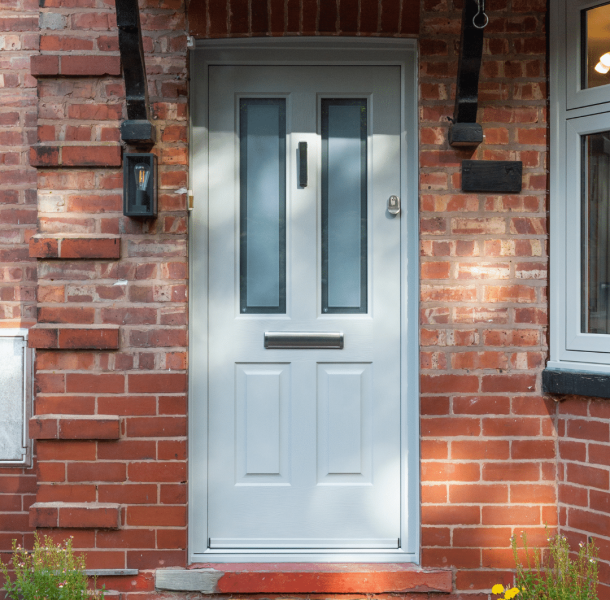 rockdoor jacobean composite door installed by alexander windows in alderley edge. Photograph shows the external view.