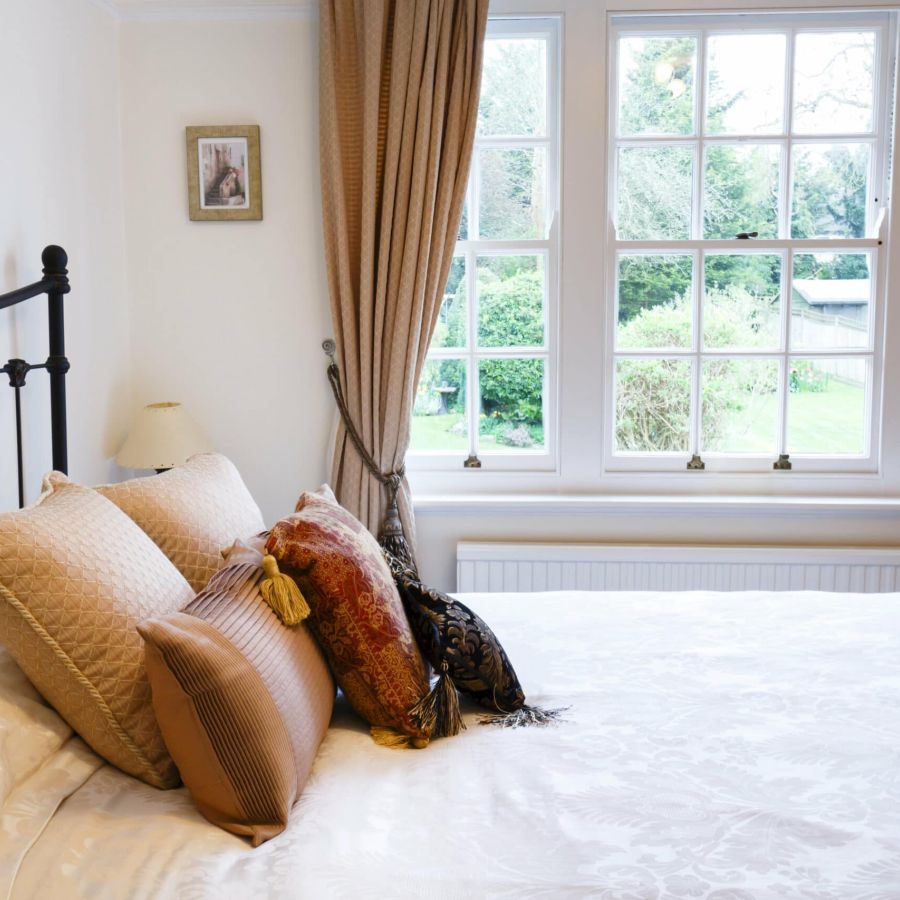 White sash window in bedroom