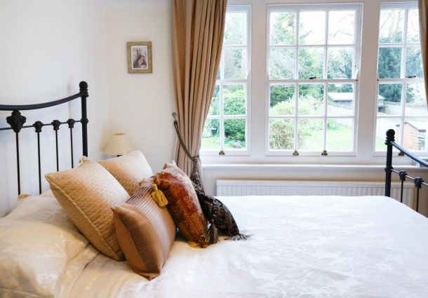 White sash window in bedroom