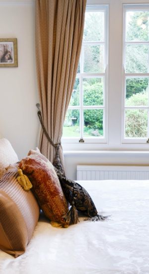 White sash window in bedroom