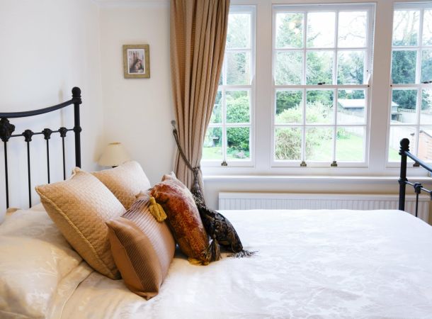 White sash window in bedroom