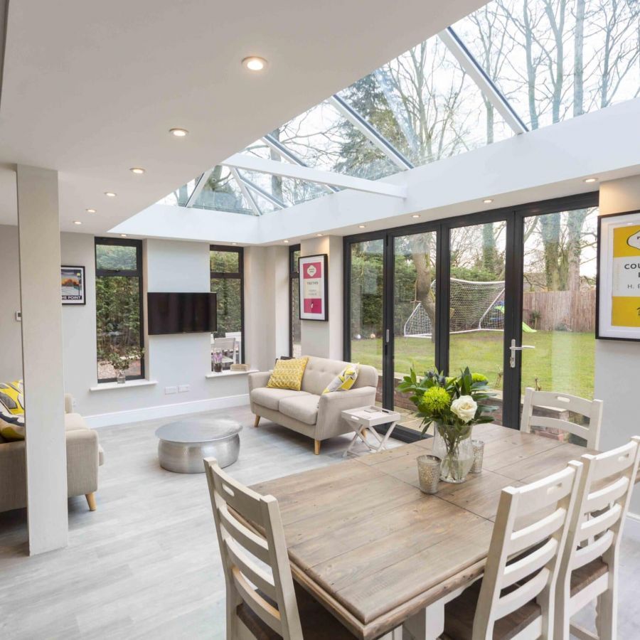 Large conservatory with dining table	