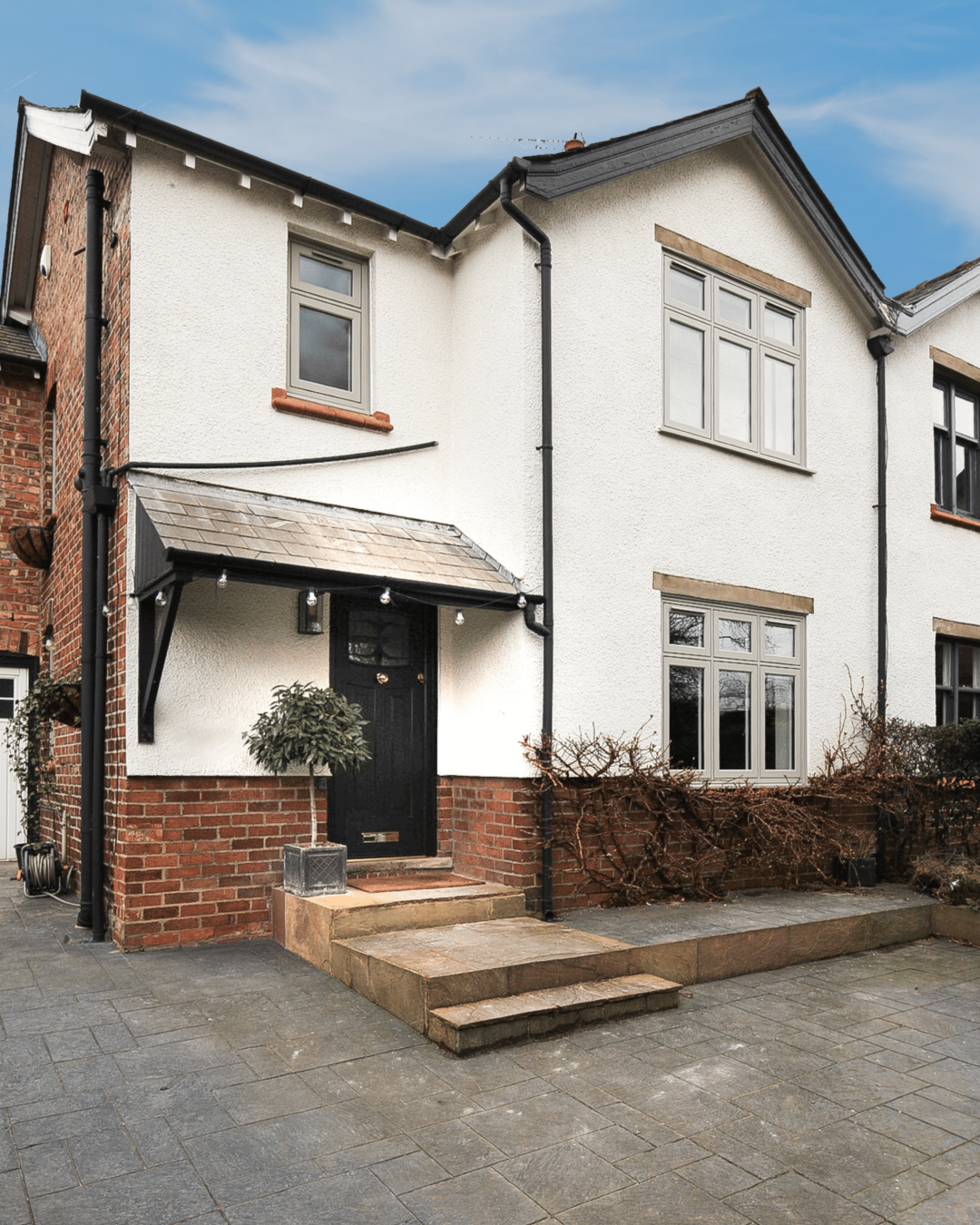 rockdoor newark in black with gold furniture and residence 7 flush windows in sage