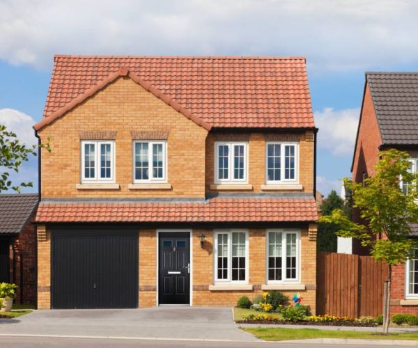 detached, brick house with uPVC casement windows