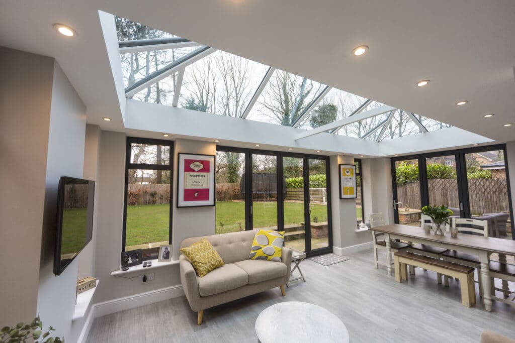 An example of an ultraframe glass conservatory roof. photograph from the inside looking out.