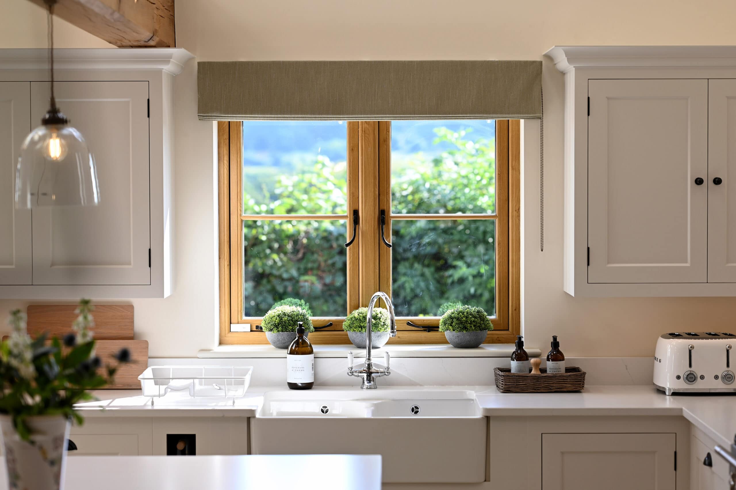 The Residence Collection R9 flush casement window in Irish Oak, in stylish kitchen