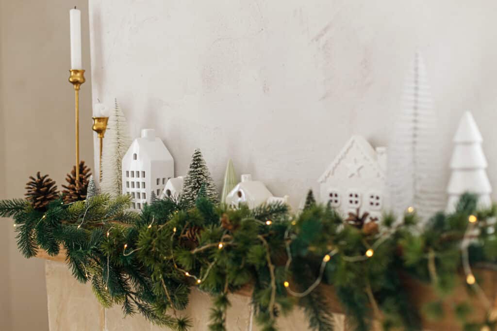 christmas decorations running along a fireplace