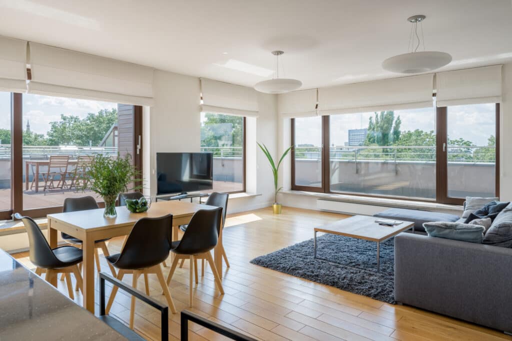 sliding patio doors in a modern living / dining space