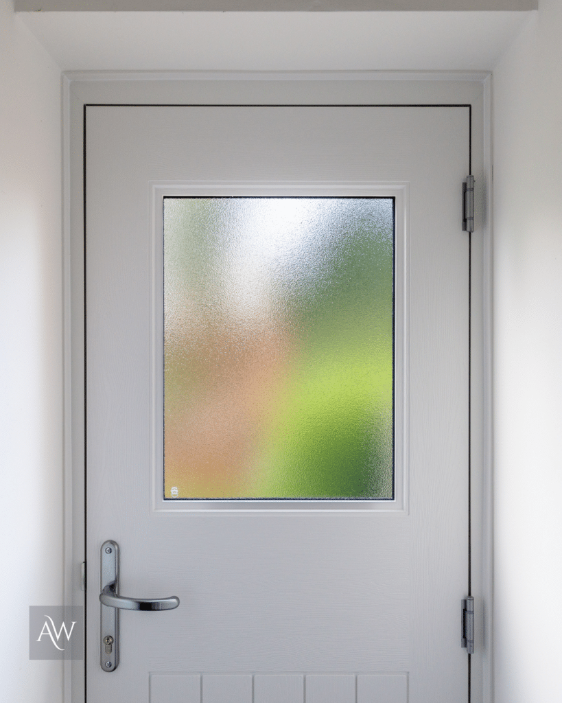 rockdoor cottage view light composite back door installed by alexander windows (internal closeup)