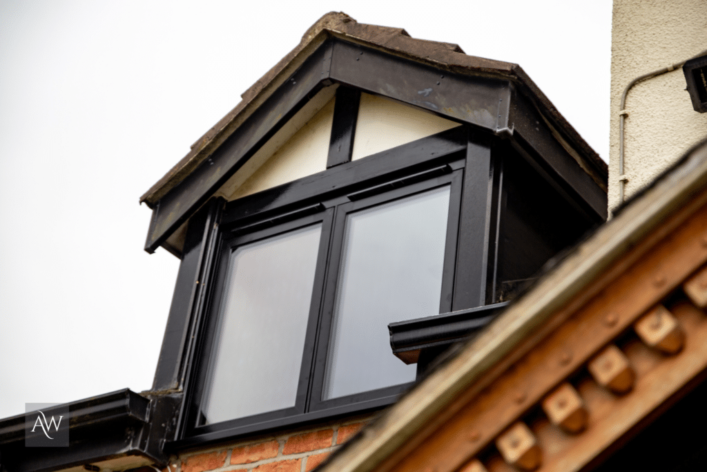 external shot of black aluminium flush casement windows